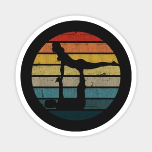 Acroyoga Silhouette On A Distressed Retro Sunset design Magnet